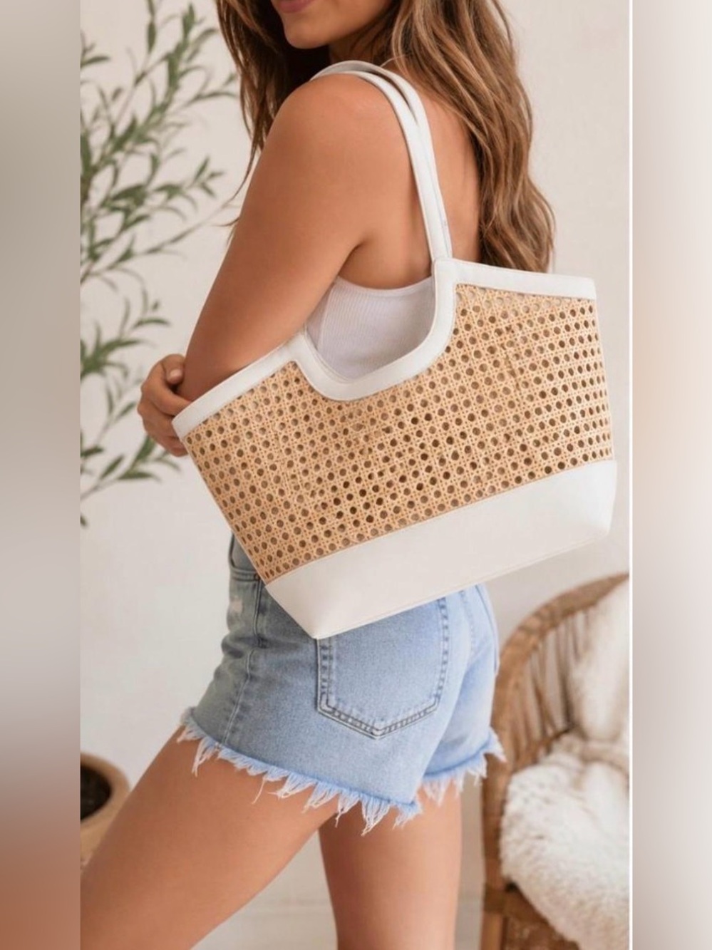 A New Day Straw Caning Tote Bag natural woven cane design white trim detailing.